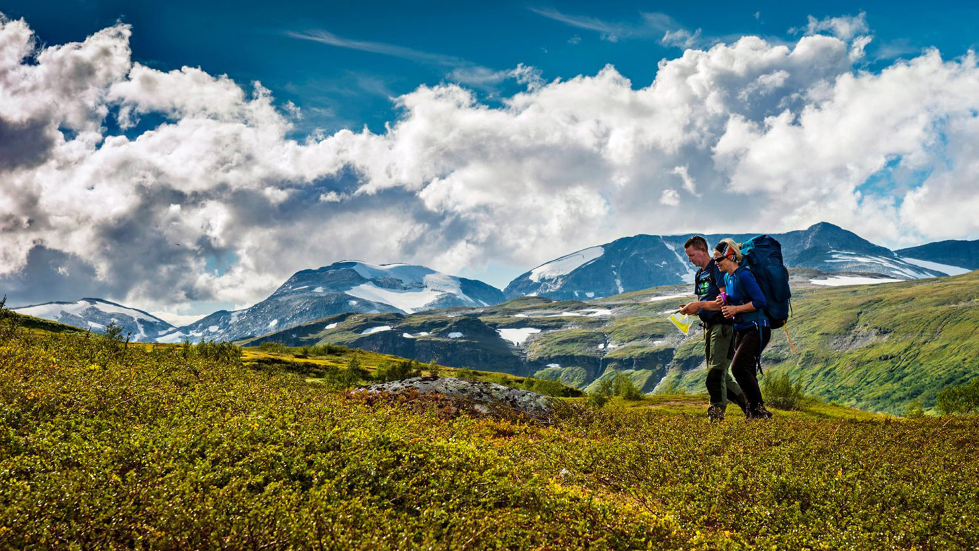Two people hiking in the mountains